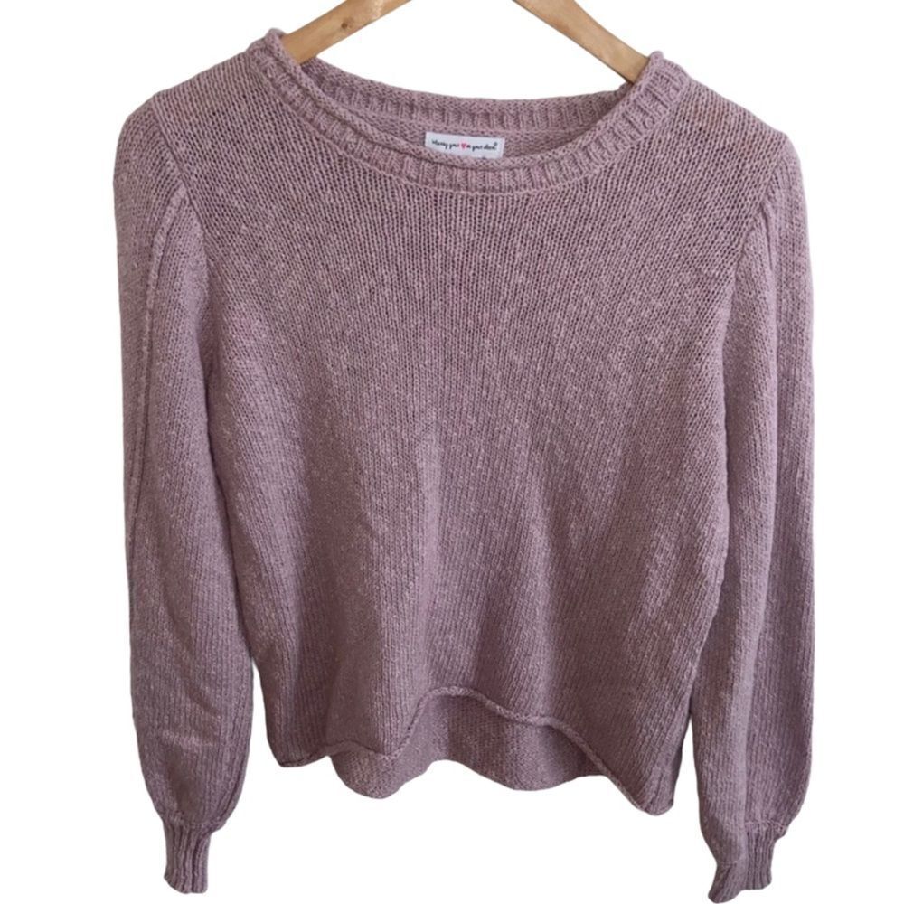 Wearing your ❤️ on your sleeve sweater